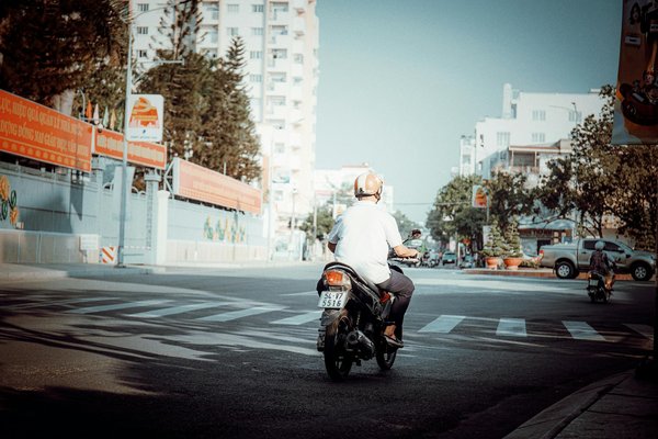 What should you consider before modifying your car's exhaust system?